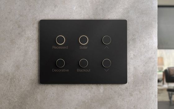 Lutron Alisse keypad on a polished plaster wall